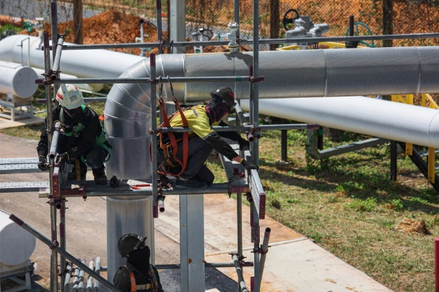 Workers repairing commercial gas line system in Long Island