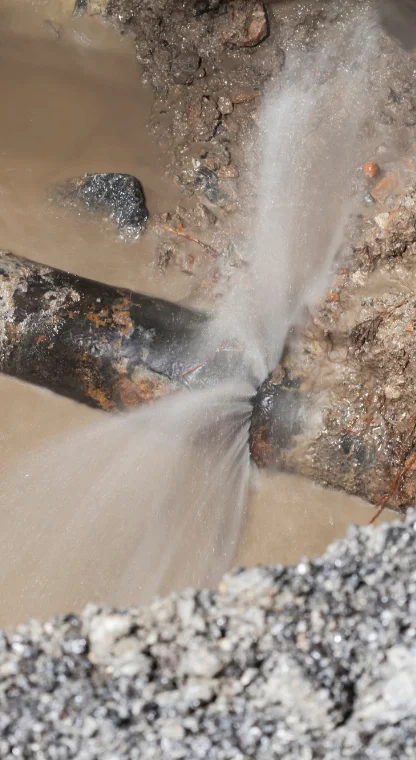 Burst water pipe under a foundation showing a slab leak.